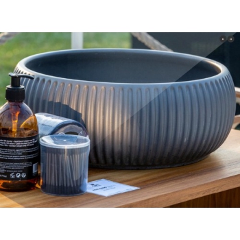 Cipì Round countertop sink in large polished concrete