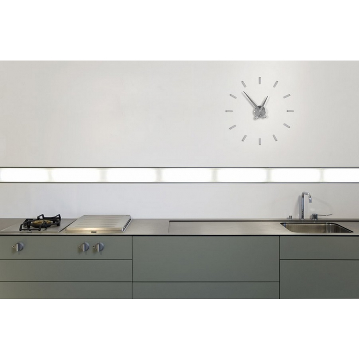 Punto Suspensivos clock by Nomon