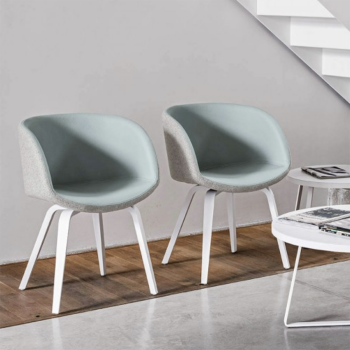 Sonny armchair upholstered in fabric or leather by Midj
