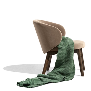 Tuka upholstered and enveloping armchair by Connubia