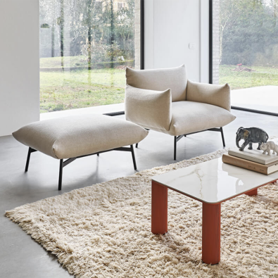 AREA pouf with four legs in painted metal