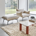 AREA pouf with four legs in painted metal