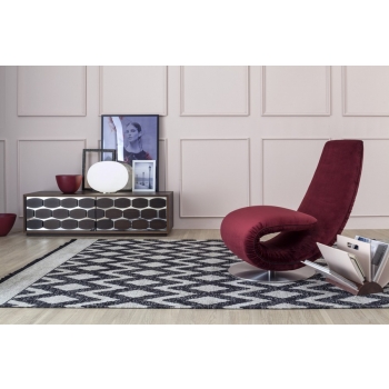 Tonin's swirl a chaise longue that becomes a pole