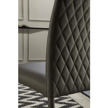 Charm Elite chair by Tonin Casa upholstered and covered in leather or eco-leather