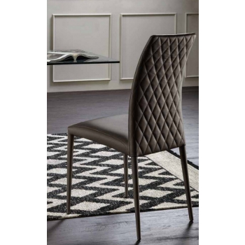 Charm Elite chair by Tonin Casa upholstered and covered in leather or eco-leather