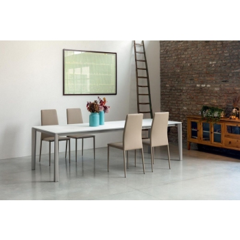 Upholstered chair covered in Renee ecological leather by Ingenia Bontempi