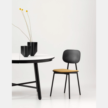 Tata Young chair with padded seat by PoinHouse